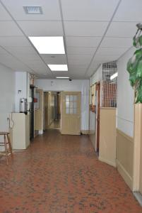 an empty hallway in an office building at Bowery Grand Hotel in New York