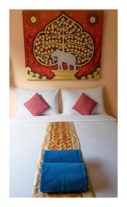 Postel nebo postele na pokoji v ubytování All in 1 Guesthouse