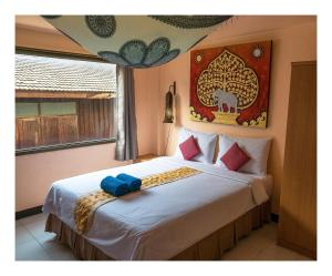 Postel nebo postele na pokoji v ubytování All in 1 Guesthouse