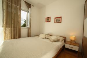 Ένα ή περισσότερα κρεβάτια σε δωμάτιο στο Apartment Star