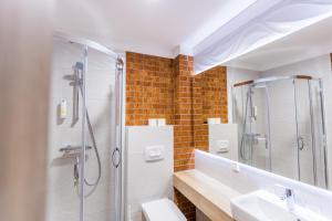 Kúpeľňa v ubytovaní Hotel Falcon