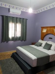 Ένα ή περισσότερα κρεβάτια σε δωμάτιο στο Merzouga Luxury Apartment +51 φωτογραφίες