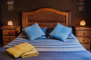 Cama ou camas em um quarto em Cabañas Valle de Montañas