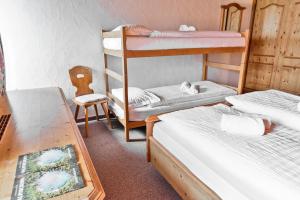 Posteľ alebo postele v izbe v ubytovaní Hotel Bernina Hospiz