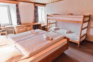 Posteľ alebo postele v izbe v ubytovaní Hotel Bernina Hospiz