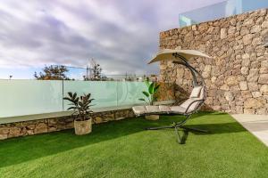 Um jardim no exterior de Deluxe 2 bedrooms with chillout terrace