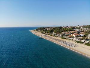 an aerial view of a beach and the ocean at Summer Sun in Skala