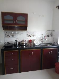 Kuchyň nebo kuchyňský kout v ubytování Casberly Apartment