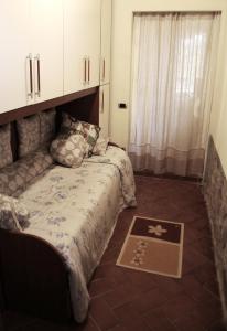 A bed or beds in a room at Tenuta La Silva