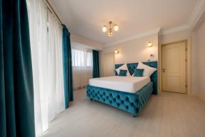 Postel nebo postele na pokoji v ubytování Hotel Casa Fiori