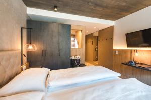 Posteľ alebo postele v izbe v ubytovaní Seehotel Einwaller - adults only