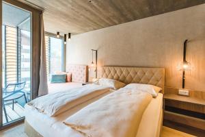 Posteľ alebo postele v izbe v ubytovaní Seehotel Einwaller - adults only