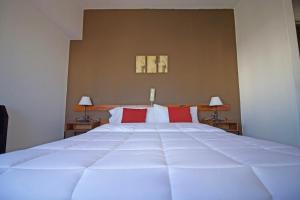Кровать или кровати в номере Hotel Santa Eulalia II