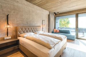 Posteľ alebo postele v izbe v ubytovaní Seehotel Einwaller - adults only
