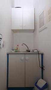 Kuchyň nebo kuchyňský kout v ubytování Smaragda Rooms & Studios