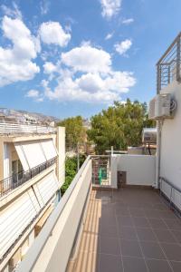 a view from the balcony of a building at Solon - Deluxe City Center Apartment in Athens