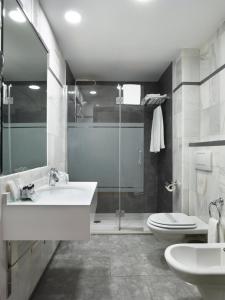 Kúpeľňa v ubytovaní Hotel Maestranza