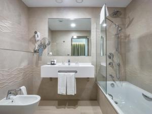 Kúpeľňa v ubytovaní Hotel Maestranza