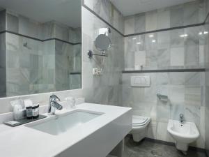 Kúpeľňa v ubytovaní Hotel Maestranza