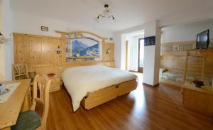 Postel nebo postele na pokoji v ubytování Hotel Presena