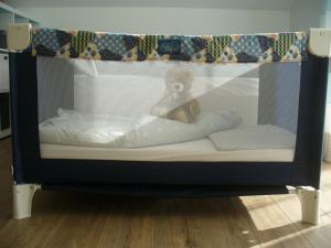 Ein Bett oder Betten in einem Zimmer der Unterkunft Ferienwohnung Rheinaue