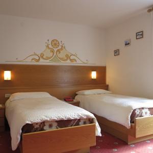 Postel nebo postele na pokoji v ubytování Hotel Presena