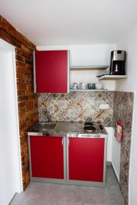Kuchyňa alebo kuchynka v ubytovaní Apartman Kupa