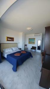 Postel nebo postele na pokoji v ubytování B&B Aquila Reale