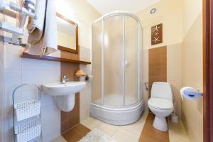 Koupelna v ubytování Apartament Słoneczny Wylotowa + 27 fotografií
