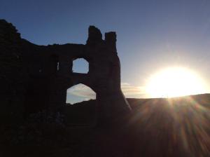 an old building with the sun in the sky at Ortari@70 in Bishopston