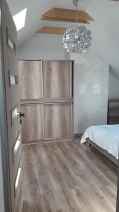Rúm í herbergi á Apartmán ZA-KA 1 ubytování Litovel