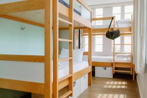 a bunk bed with two bunk beds in a room at The Quisby in New Orleans