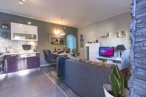 TV a/nebo společenská místnost v ubytování Apartment Gloria2