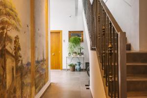 a hallway with a staircase in a house at Barracart Apartments in Valencia