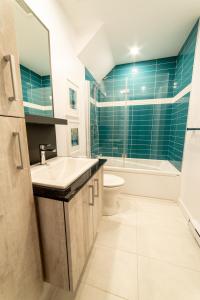 ห้องน้ำของ Aux Havres Urbains - Le Penthouse de la 3ième Avenue