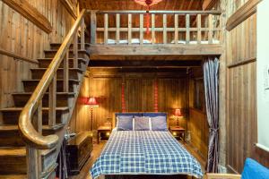 Postel nebo postele na pokoji v ubytování Pig's Boutique Hotel Bishan