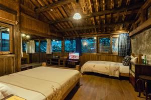 Voodi või voodid majutusasutuse Pig's Boutique Hotel Bishan toas