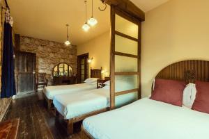 Voodi või voodid majutusasutuse Pig's Boutique Hotel Bishan toas