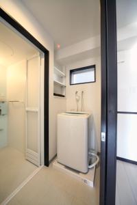 EX Itoman Apartment 201 tesisinde bir banyo