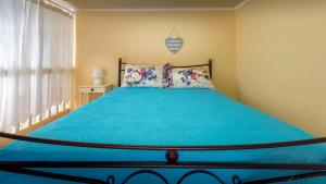 Postel nebo postele na pokoji v ubytování Amazing House in Halki