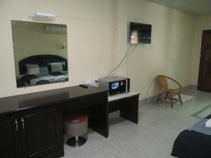 TV a/nebo společenská místnost v ubytování Pineapple Guesthouse
