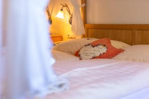 Voodi või voodid majutusasutuse Hotel - Pension Scheiblechner toas