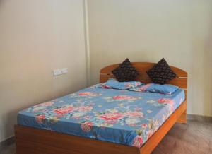 Katil atau katil-katil dalam bilik di Hotel Alas Garden