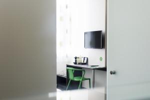 Sjónvarps- og/eða afþreyingartæki á eee Hotel Traun