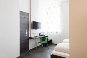 Sjónvarps- og/eða afþreyingartæki á eee Hotel Traun