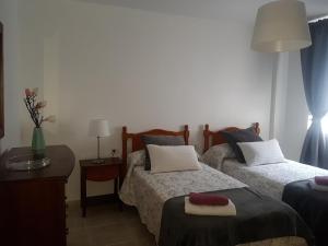 Postel nebo postele na pokoji v ubytování Tazacorte SOL