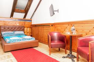 Postel nebo postele na pokoji v ubytování Fortezza rooms