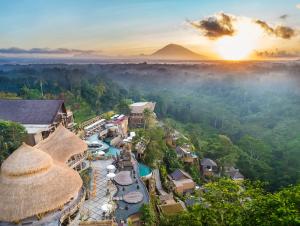
a view from a balcony overlooking a city at The Kayon Jungle Resort in Ubud
