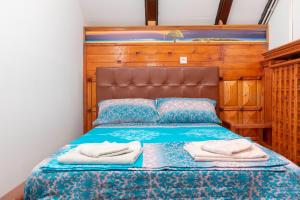 Postel nebo postele na pokoji v ubytování Fortezza rooms