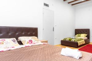 Postel nebo postele na pokoji v ubytování Fortezza rooms